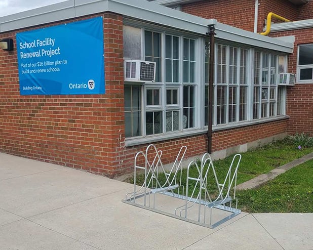 Stacker commercial bike rack installed at a Toronto school for space-efficient bicycle parking